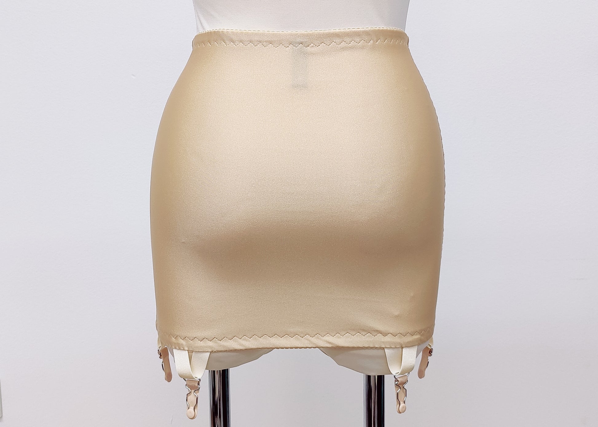 beige Open bottom Glenda girdle made with opaque front and back panels with sheer power mesh side panels. Can be made with 4 or 6 extra wide straps. back view