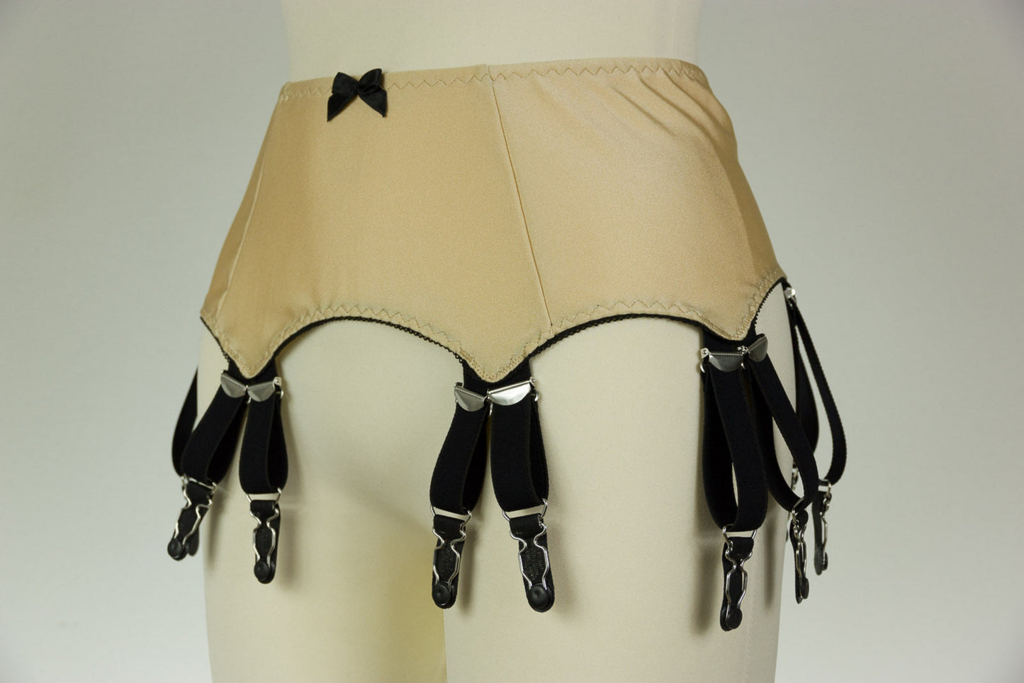 beige Joan garter belt with 12 black straps