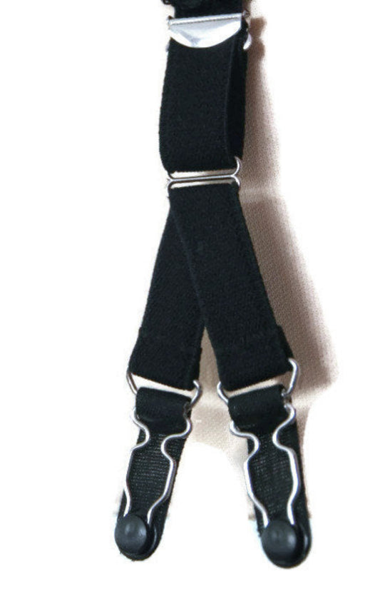 A pair of black Y-straps with adjustable plastic clips and metal hardware, designed for use with garter belts.