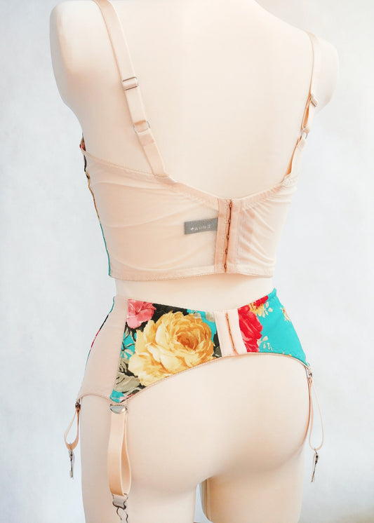 turquoise and pink floral long-line Rosie bra, shown with matching garter belt, back view
