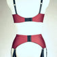 dark red retro style, 6 strap Scarlett garter belt with black straps and lace side inserts, shown with matching Lucy quarter cup bra, back view