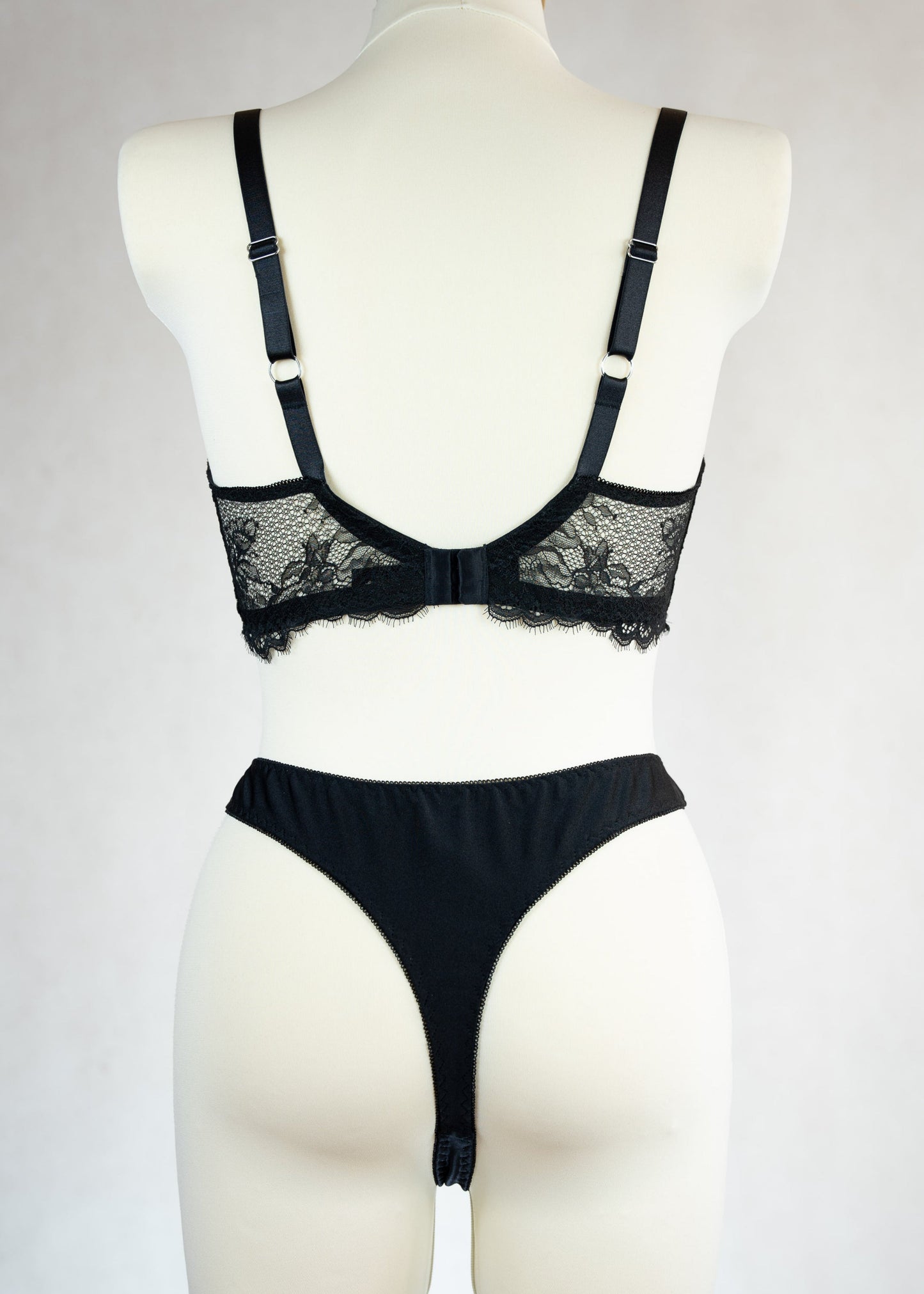 black high waist Ivy thong panties with lace side panels, rear view