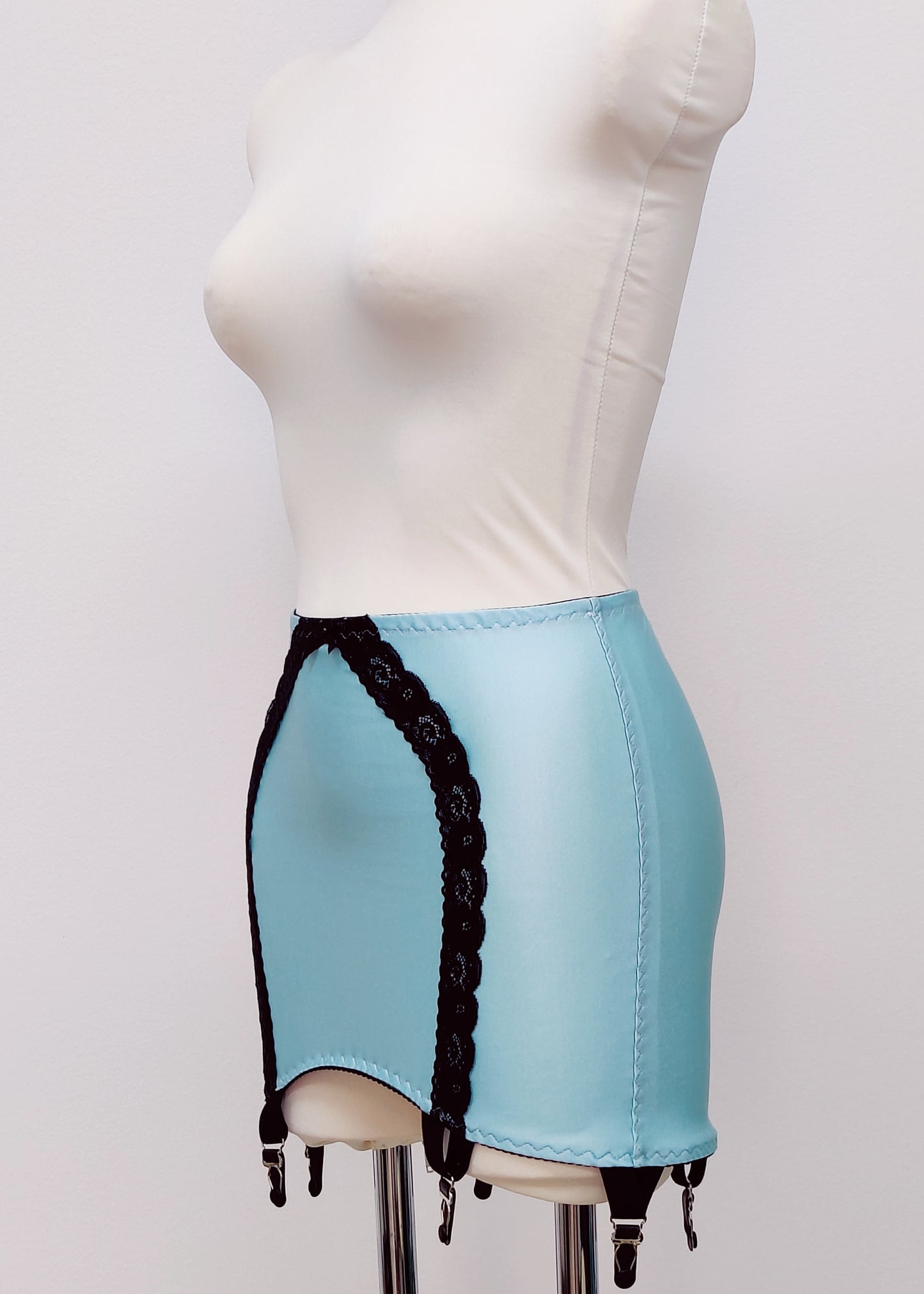 light blue 6 strap Rhonda open bottom girdle, with lace trim on the front