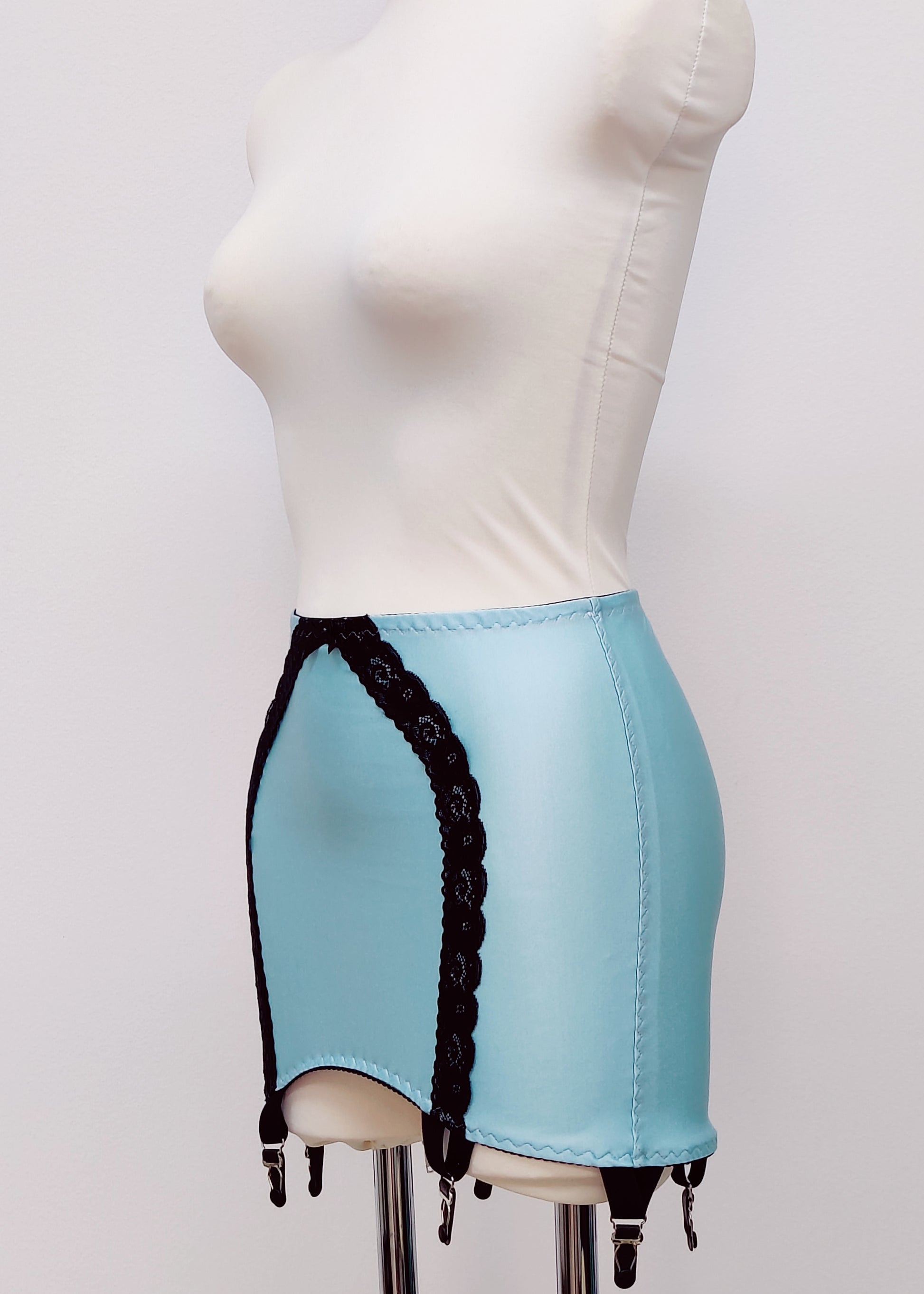 light blue 6 strap Rhonda open bottom girdle, with lace trim on the front