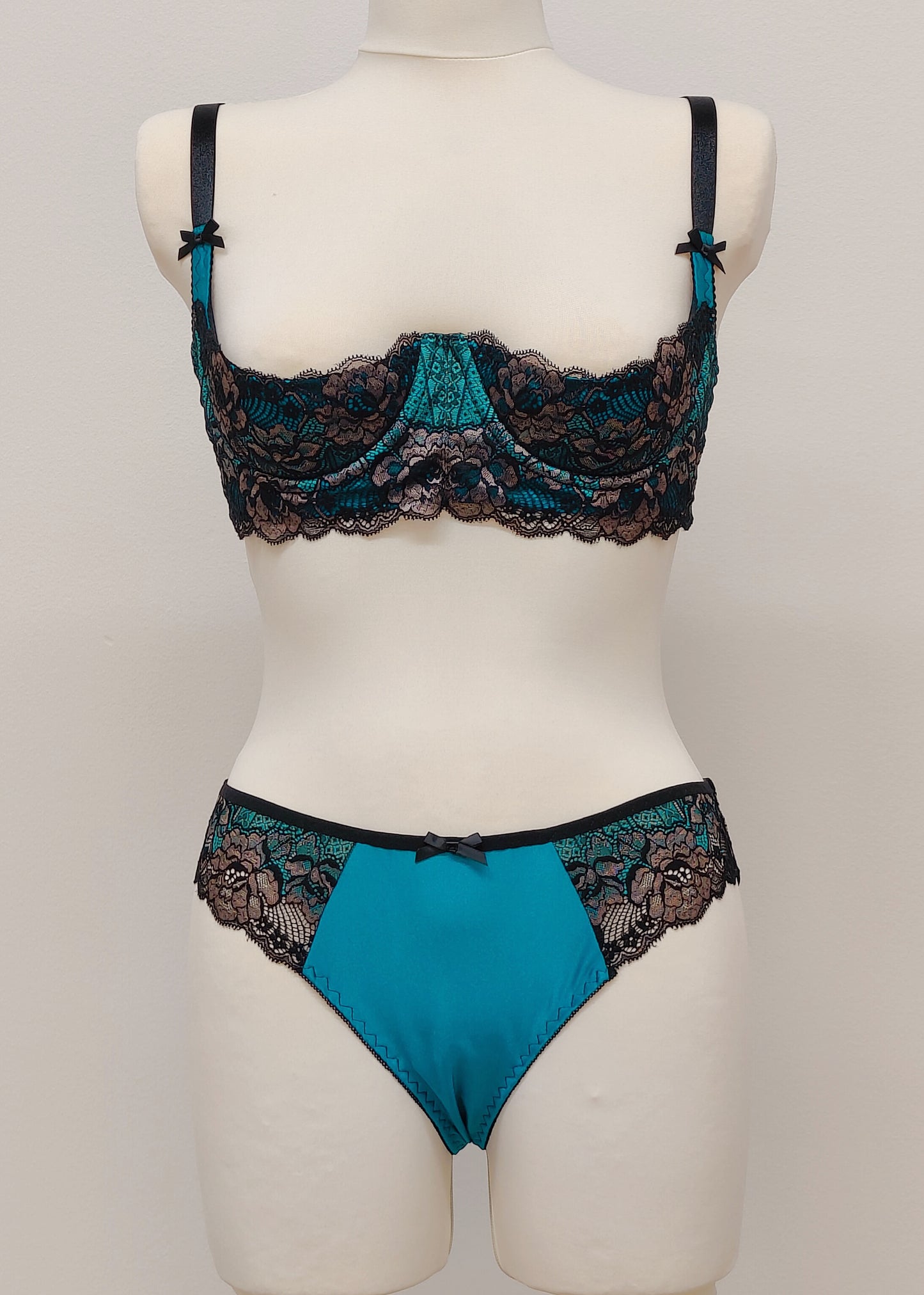 teal and black lace quarter cup bra with panties
