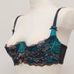 teal and black lace quarter cup bra, side view