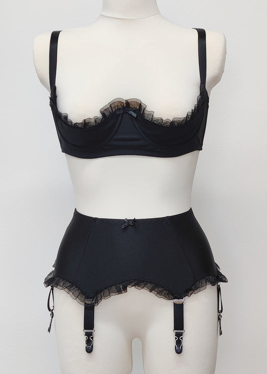 black quarter cup bra, upper edge adorned with frill trimm and gigi frill trimm garter belt