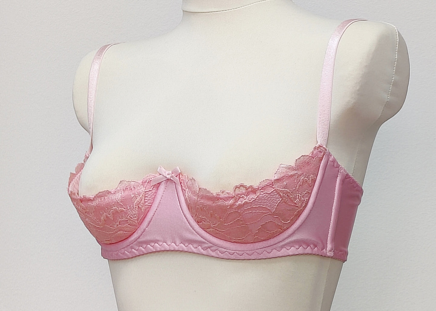 pink lace quarter cup bra, side view