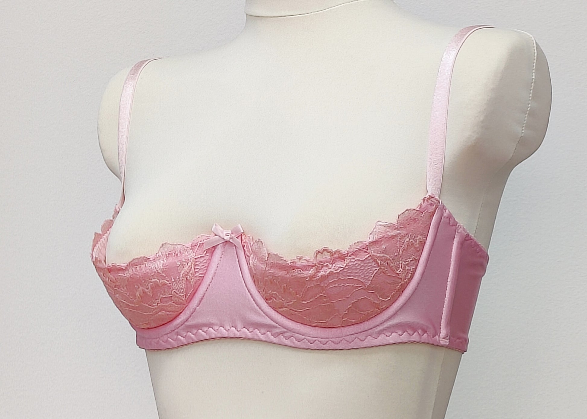 pink lace quarter cup bra, side view