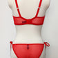 red side binding Irma panties made with dotted lingerie mesh, shown with matching Ella quarter cup bra, back view