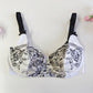 white and black soft cup bra, size 34C