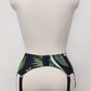 Veronica is classic retro style, 6 strap garter belt, tropical florals on black, back view