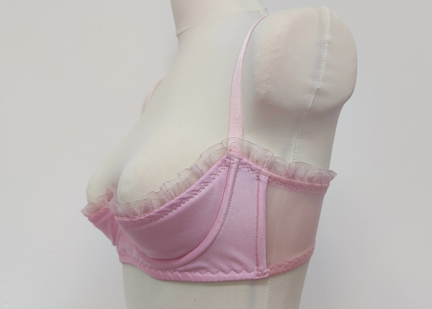 pink Lilith quarter cup bra with ruffle trim, side view