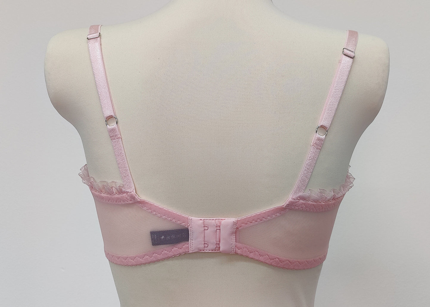 pink Lilith quarter cup bra with ruffle trim, back viw