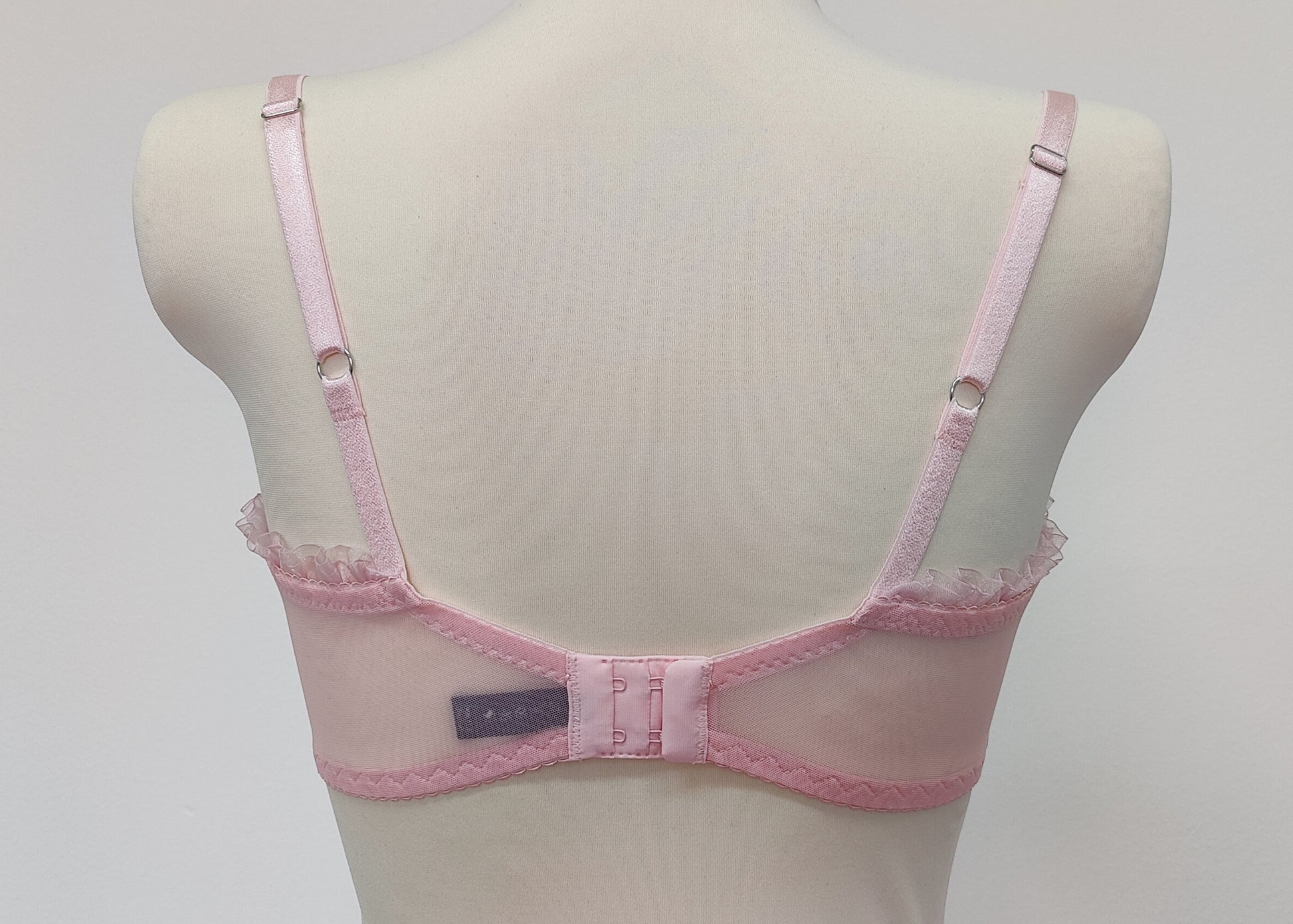 pink Lilith quarter cup bra with ruffle trim, back viw