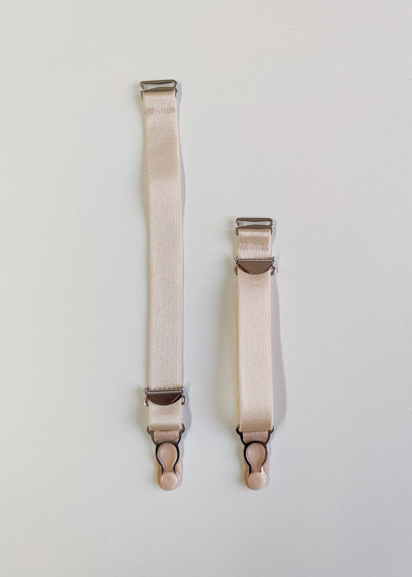 beige hook on garter straps, suspender straps