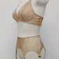 Beige 6 strap retro style garter belt with side lace panels, shown with matching lace bralette, side view