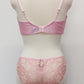 pink lace quarter cup bra, with matching panties, back view