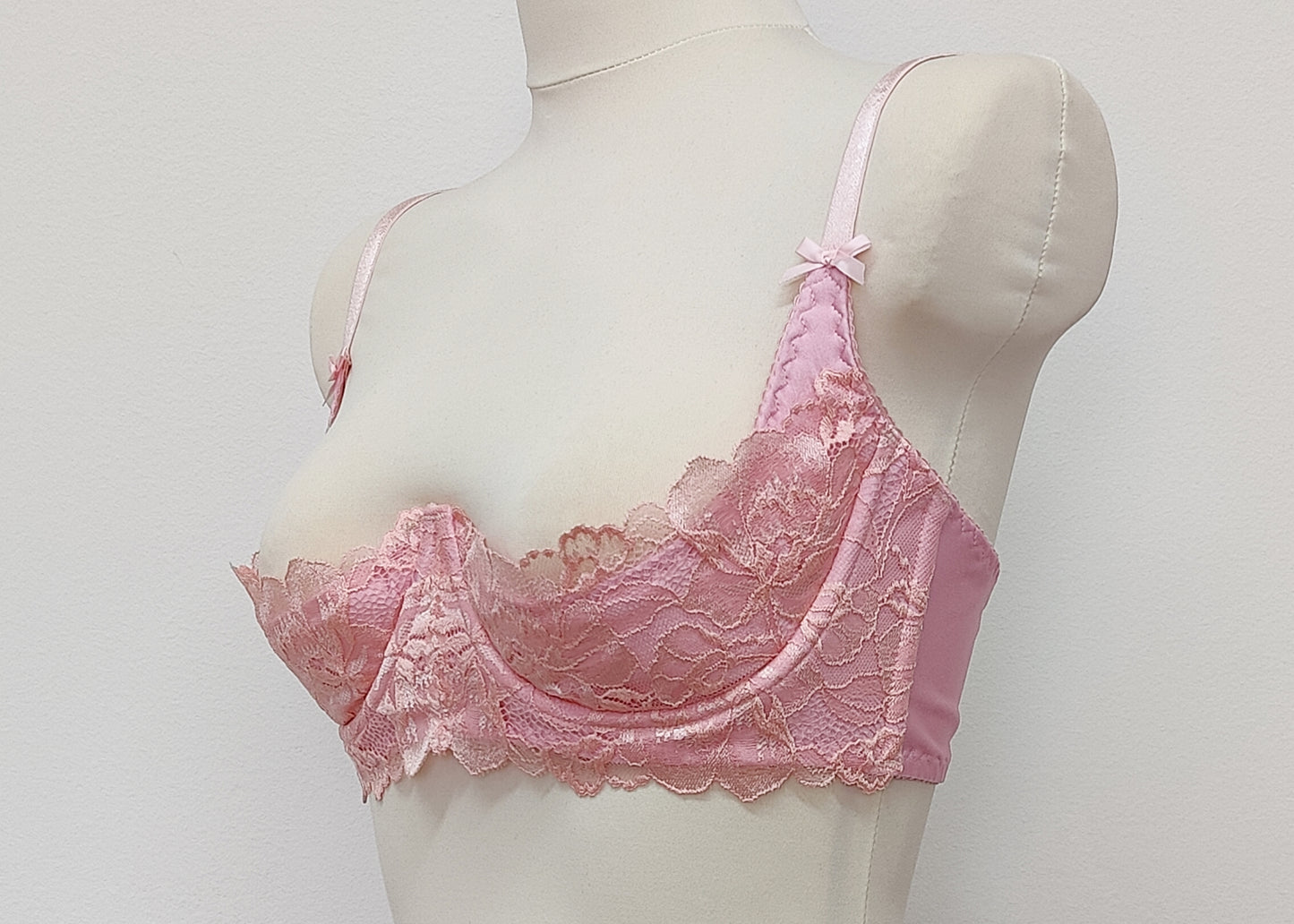 pink lace quarter cup bra, side view