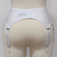 White narrow Nina garter belt, 60's style with 6 adjustable straps and hook and eye closure at the back. back view
