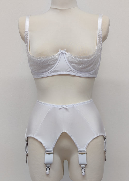 White wide Iris garter belt with a deep V-style design, featuring six extra wide adjustable straps, shown with matching white lace Lucy quarter cup bra