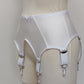 White wide Iris garter belt with a deep V-style design, featuring six extra wide adjustable straps, side view