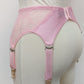 Pink lace  Mona garter belt with 6 adjustable straps and hook and eye closure, displayed on a mannequin,back view