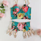 turquoise and pink floral long-line Rosie bra, shown with matching garter belt