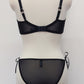 black Audrey bra with sheer upper part of the cup, with matching panties