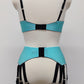 aqua blue Joan garter belt with additional straps attached to the back