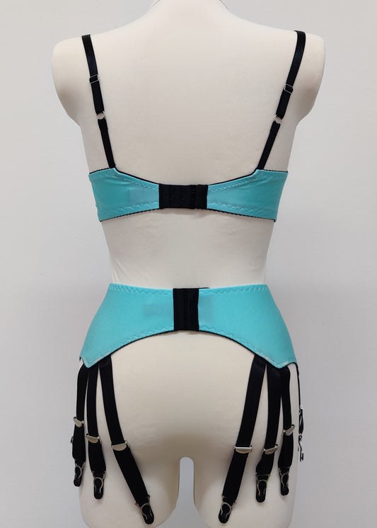 aqua blue Joan garter belt with additional straps attached to the back