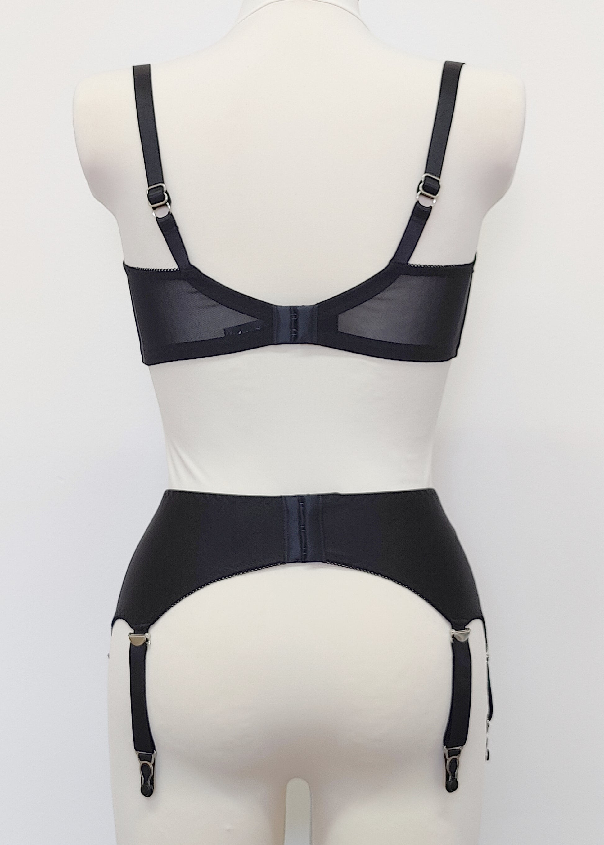 black, classic, retro style Greta garter belt with 6 straps, here shown with matching quarter cup bra, back view