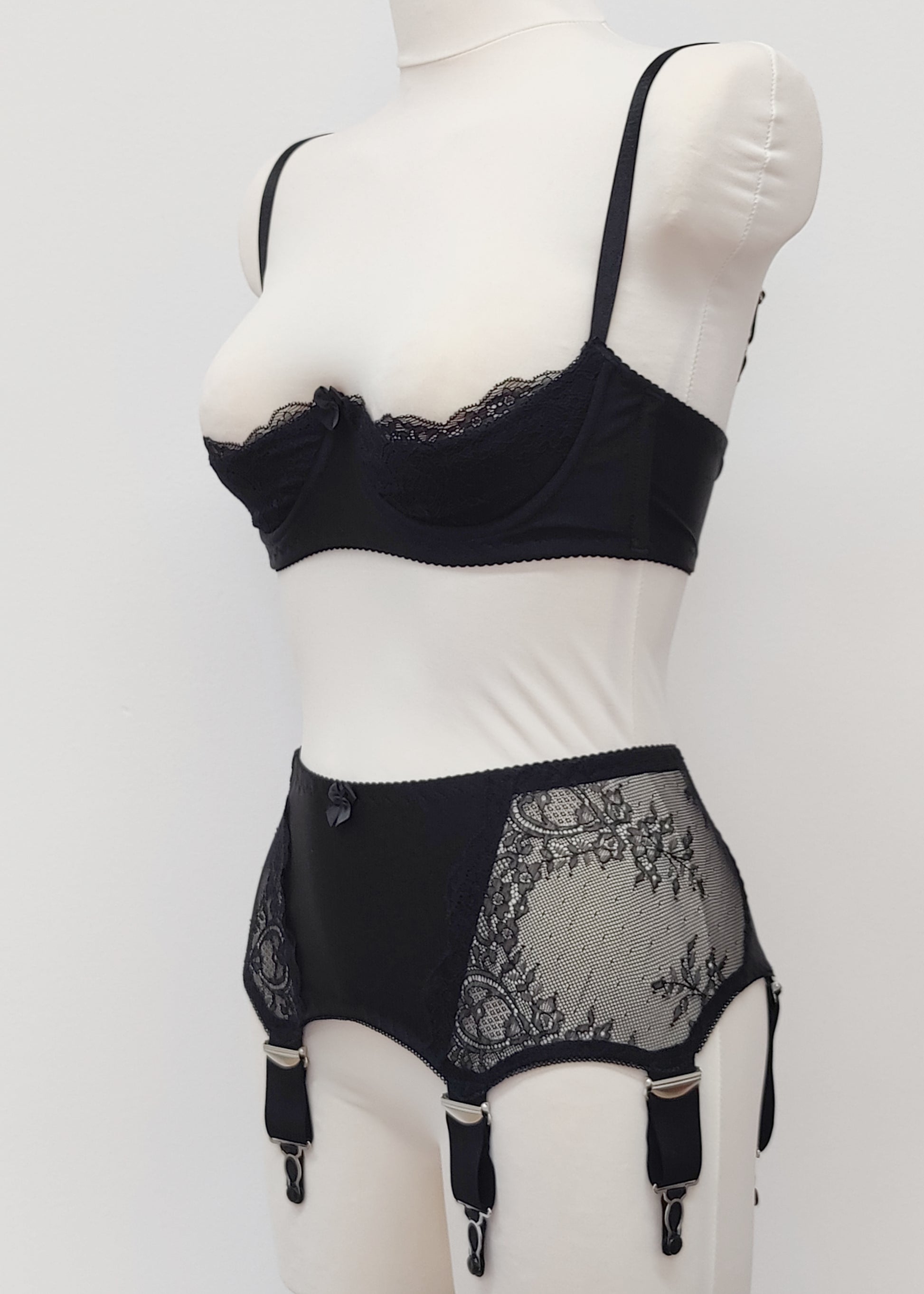 wide retro style Liliane garter belt with  6 extra wide straps and black lace side panels, here shown with matching quarter cup Lucy bra, side view