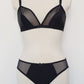 Black Mia panties with sheer side panels, here shown with matching bralette
