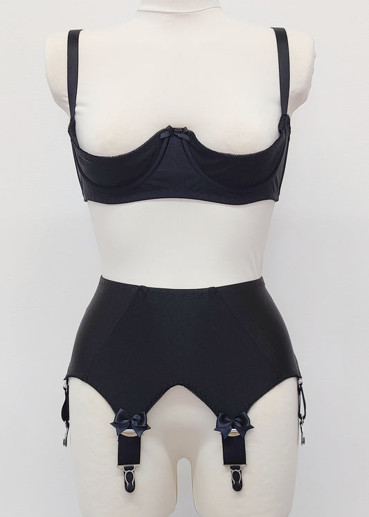 Black Iris garter belt with 6 extra wide straps and with larger bows on the front straps, shown here with matching quarter cup Gina bra