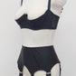 Black Iris garter belt with 6 extra wide straps, shown here with matching quarter cup Gina bra, side view
