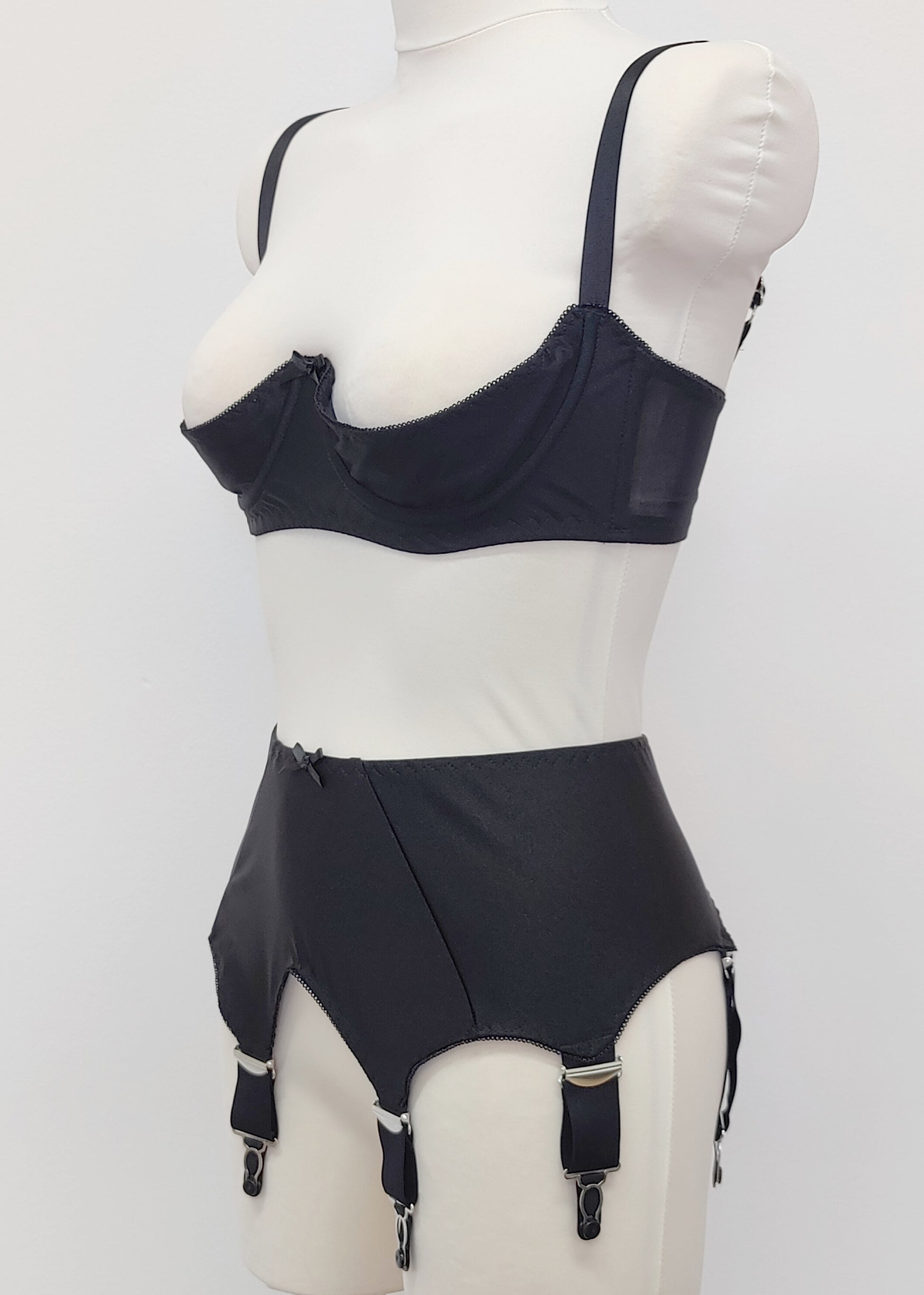 Black Iris garter belt with 6 extra wide straps, shown here with matching quarter cup Gina bra, side view