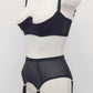 black sheer 4 strap Lula garter belt, shown with matching quarter cup Gina bra, side view
