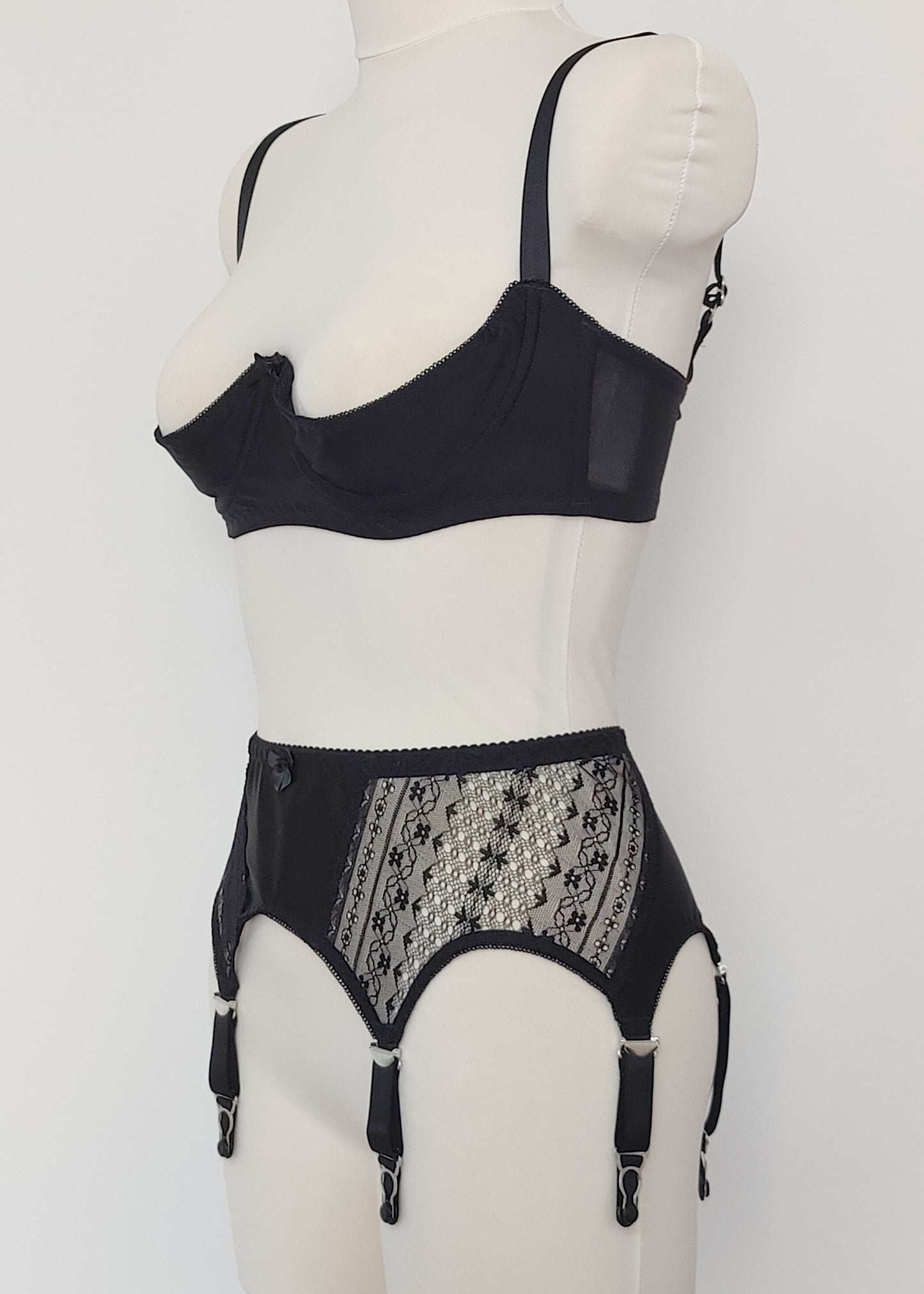 Black Mona garter belt with black lace side panels and 6 adjustable straps, here shown with Gina quarter cup, side view