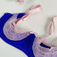 Quarter cup Lucy bra, here shown in blue with pink lace, straps and trims. Detail