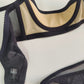 black Ella quarter cup bra made with black mesh fabric underlined with beige padding,  underwired