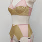 beige Audrey bra with pink sheer upper part of the cup,straps and trim, here shown with matching Stella garter belt, side view