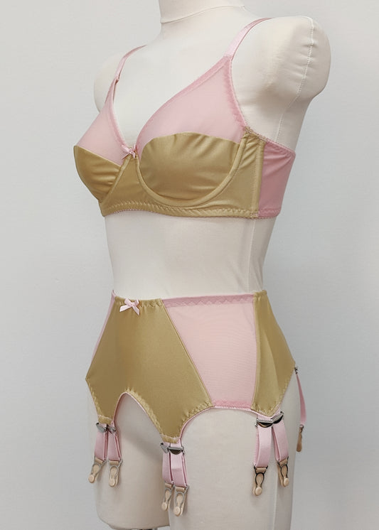 beige Audrey bra with pink sheer upper part of the cup,straps and trim, here shown with matching Stella garter belt, side view