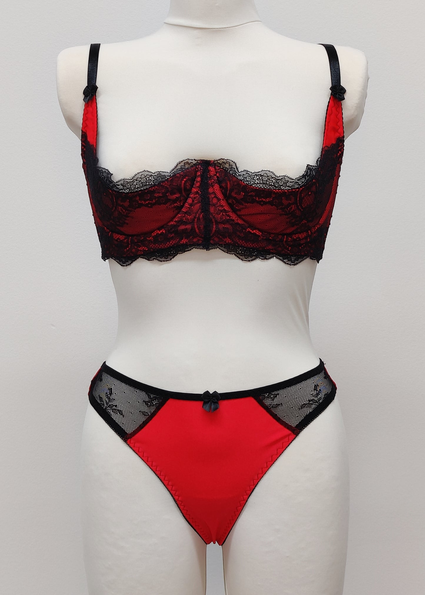 red with black lace quarter cup Lucrezia bra, shown with matching Zigi thong panties