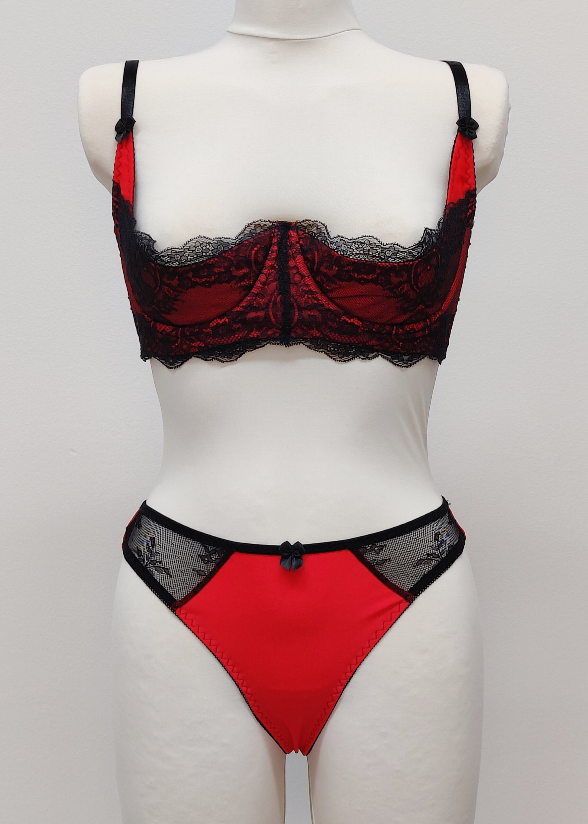 red with black lace quarter cup Lucrezia bra, shown with matching Zigi thong panties