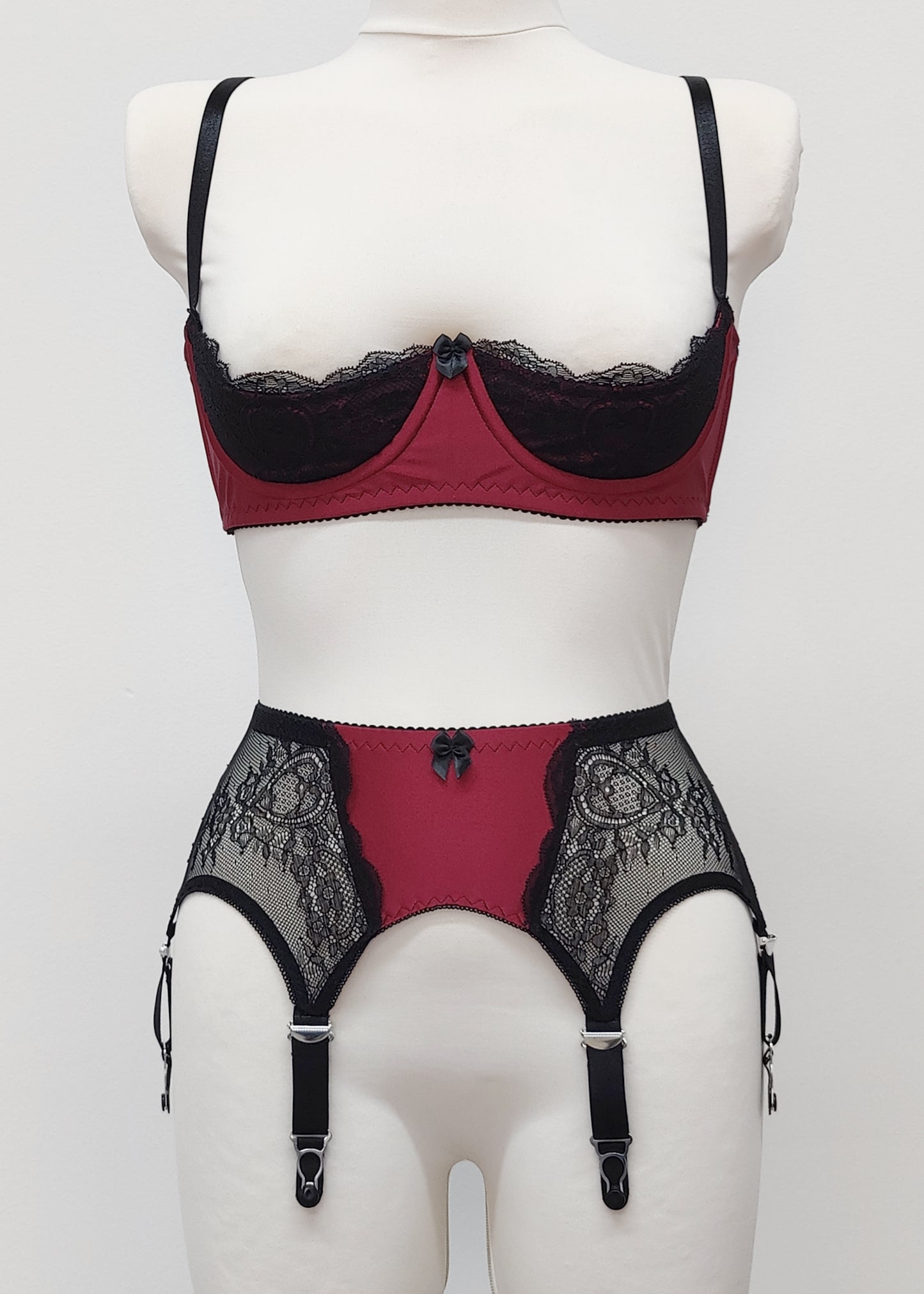 High waist Mona garter belt in maroon color with black lace side panels and 6 adjustable straps, here shown with matching Lucy quarter cup