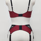 High waist Mona garter belt in maroon color with black lace side panels and 6 adjustable straps, here shown with matching Lucy quarter cup, back view