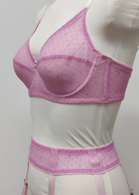 Full cup Lily bra made with fuchsia pink-star mesh fabric, here presented with matching customized Summer suspender belt, side detail
