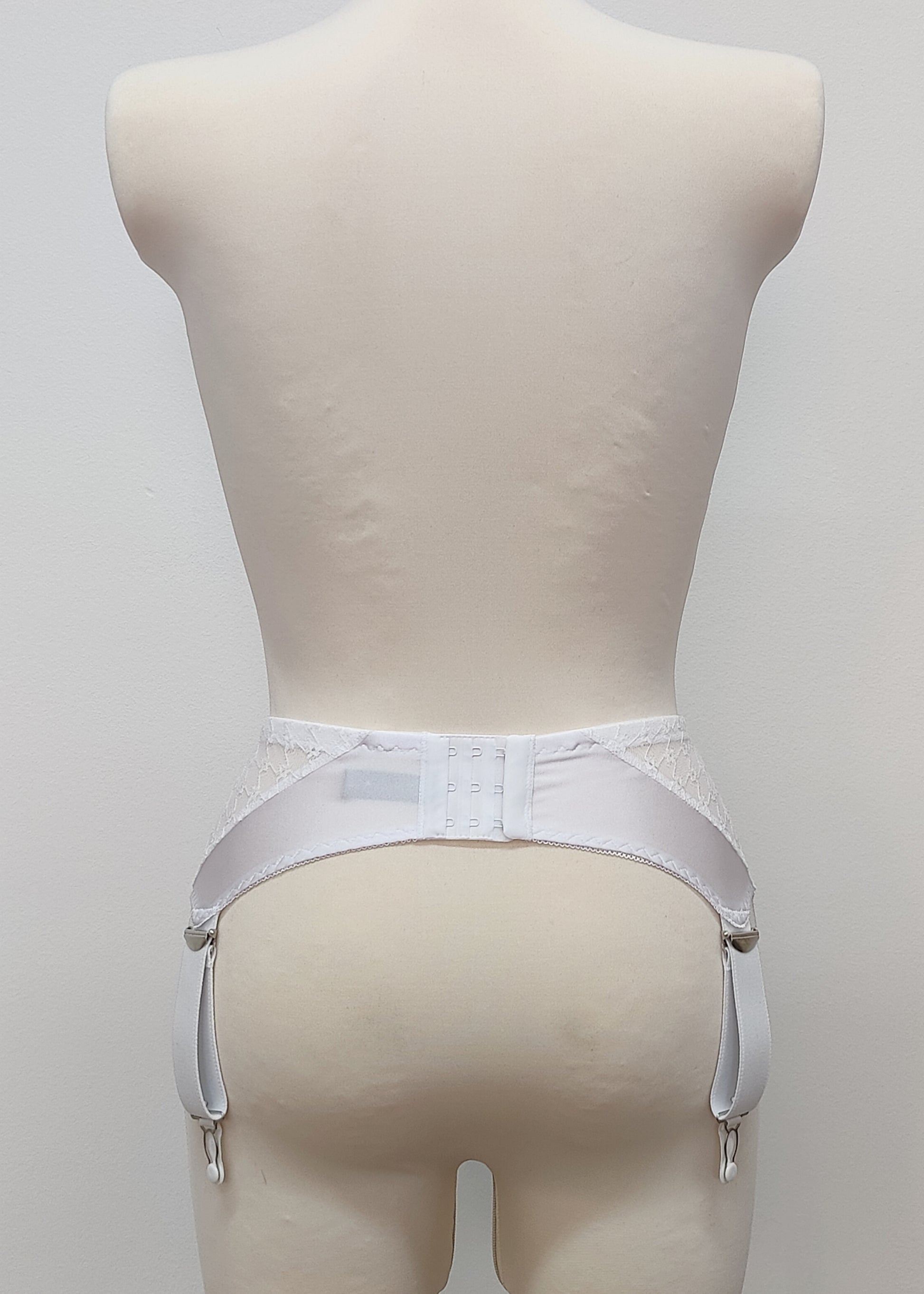 Wide retro style Liliane garter belt with white lace, 6 wide adjustable straps and hook and eye closure, back view