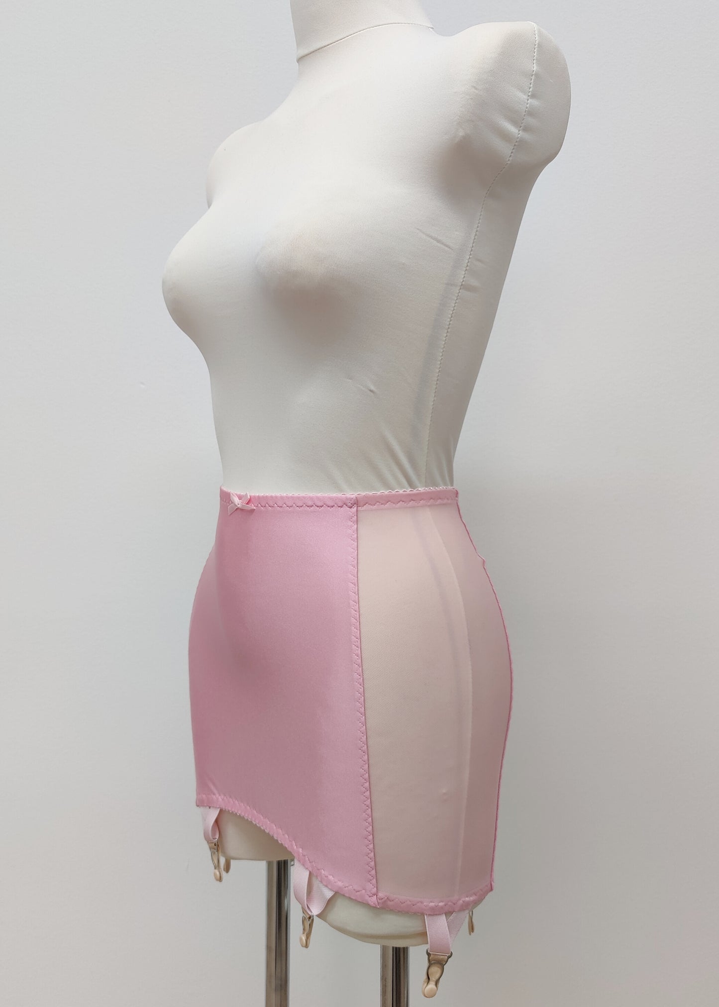 Pink light control, pull on girdle made with spandex and power mesh side panels. With 6 v style non-adjustable straps. You can have solid color girdle or mix of colors for just your own different girdle. 